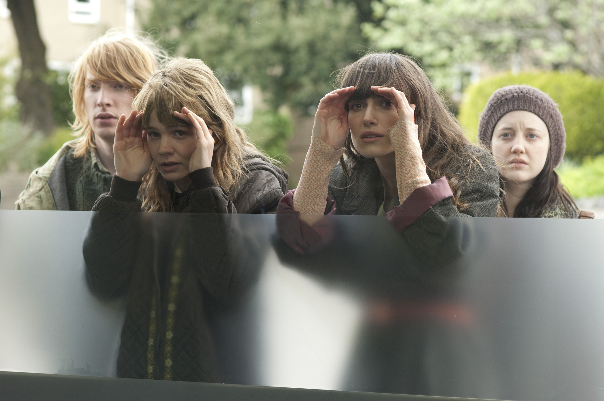 Still of Keira Knightley, Carey Mulligan, Domhnall Gleeson and Andrea Riseborough in Never Let Me Go (2010)