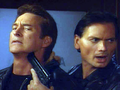 Rico makes a point to John Black (Drake Hogestyn) on Days of Our Lives.