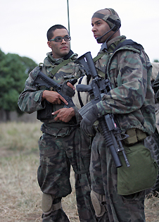 Cpl. Gabriel Garza (Rey Valentin, left) and Sgt. Antonio 'Poke' Espera (Jon Huertas) face an uncertain future in Generation Kill.