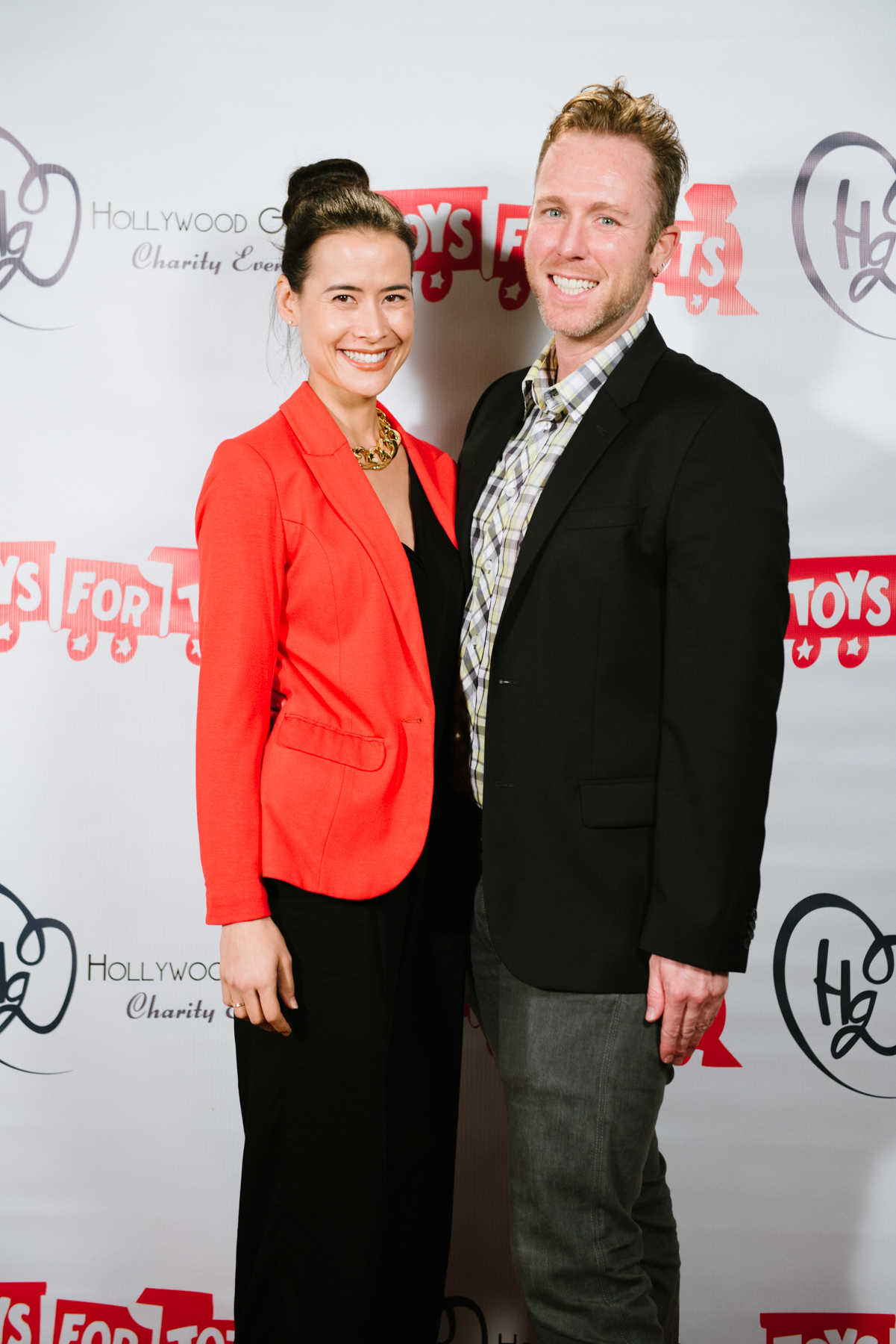 Shi Ne Nielson & Jeff Hall at Toys for Tots Hollywood Gives Charity Event. Dec. 2014