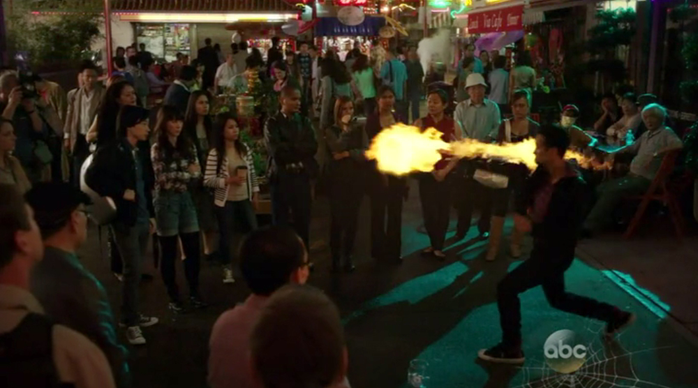 Watching a magic act take place on a Hong Kong street...in AGENTS OF S.H.I.E.L.D. - Episode 1.5: 