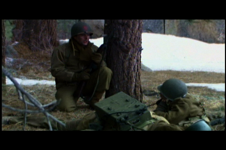 Calling in help. From the film, Battle of the Bulge.