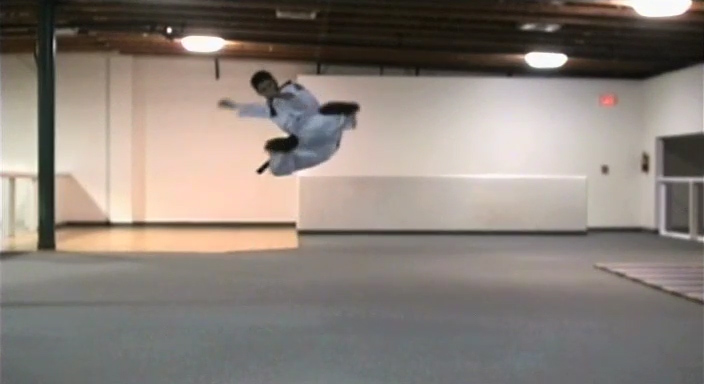 Rich throws a jump flying side kick