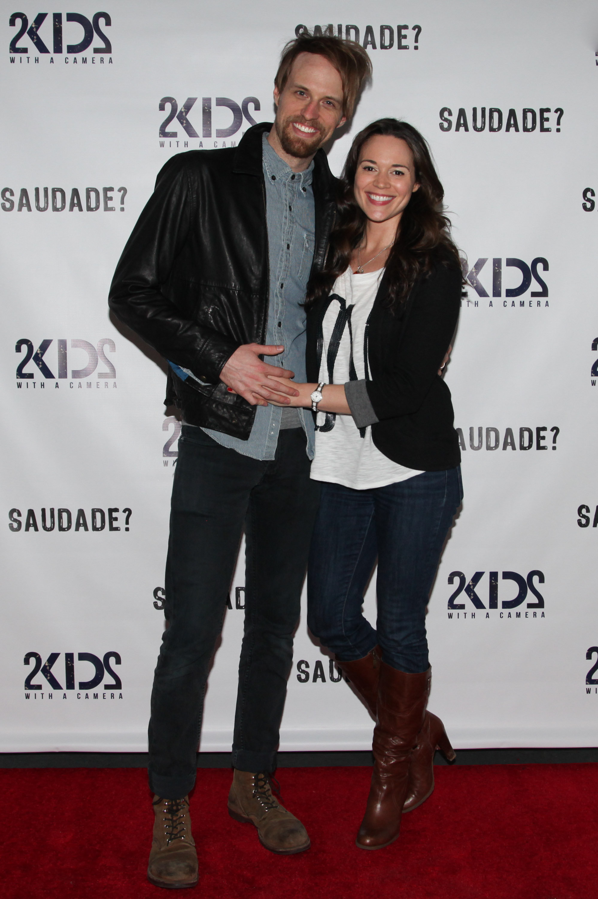 Adam David Thompson and Amber Davila at the premiere of 