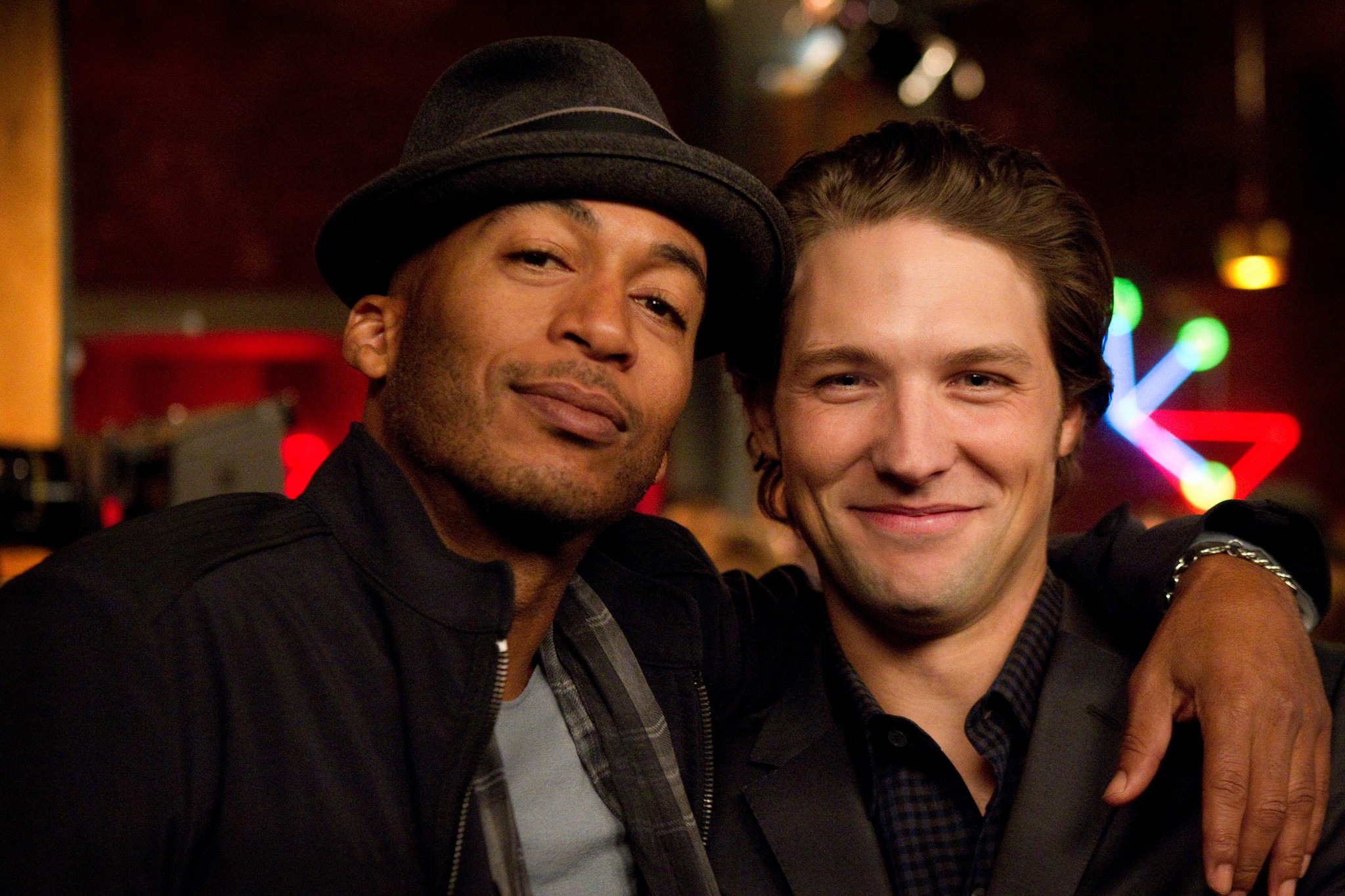 Still of James Lesure and Michael Cassidy in Men at Work (2012)