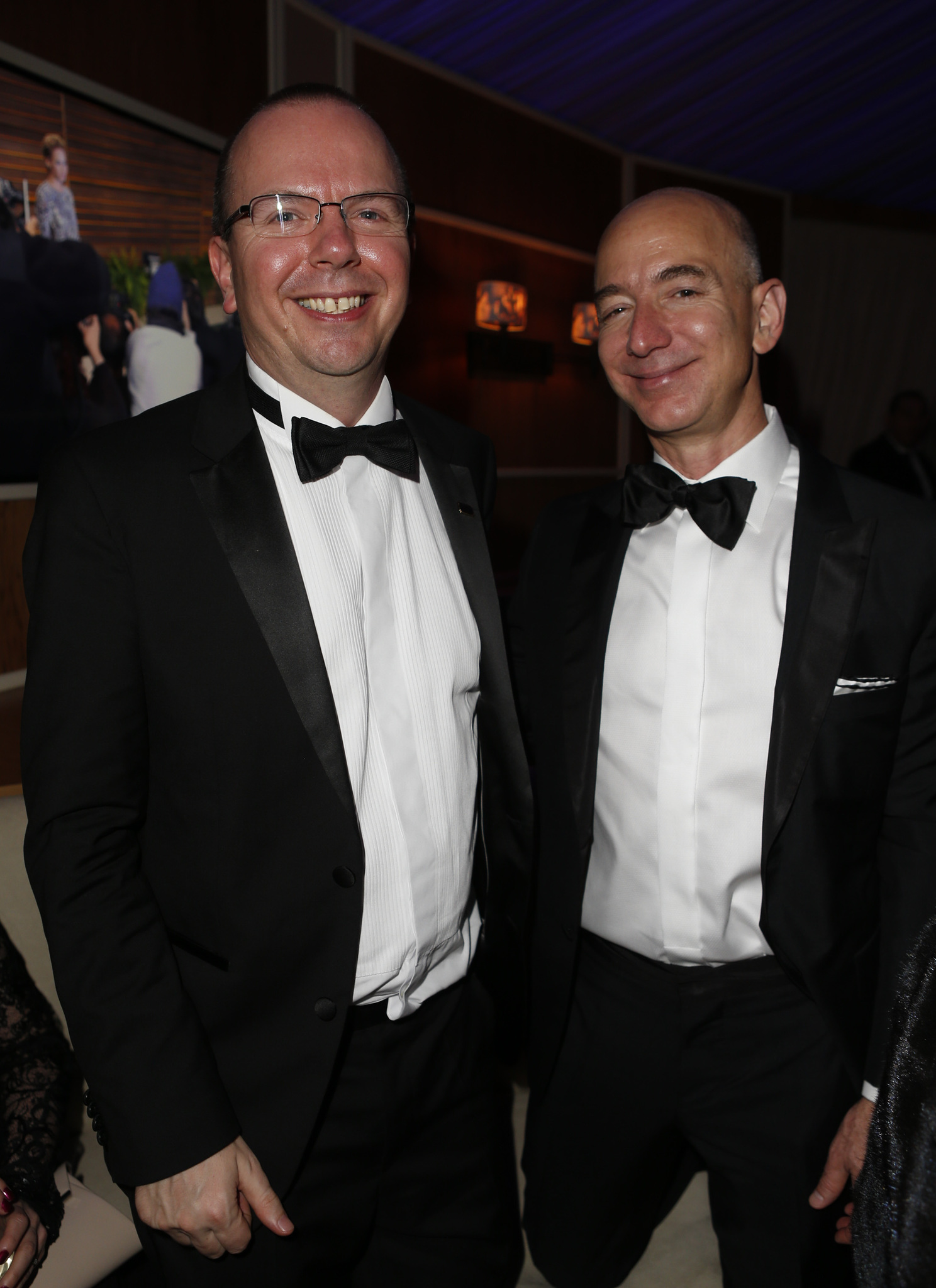 Col Needham and Jeff Bezos attend the 2014 Vanity Fair Oscar Party Hosted By Graydon Carter on March 2, 2014 in West Hollywood, California.