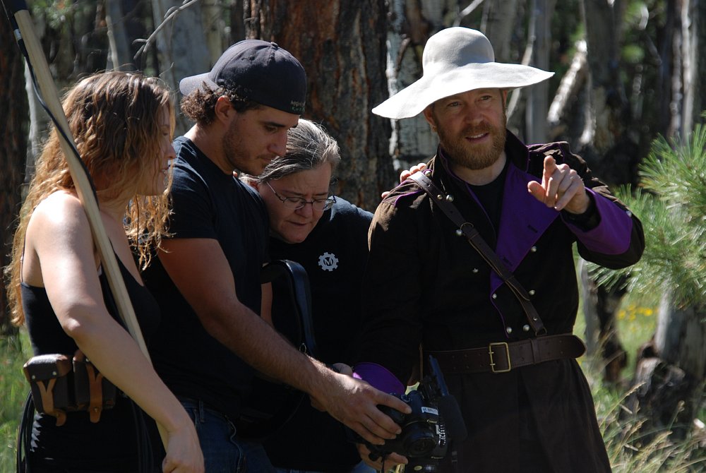 Lon Muckey in costume (Far R) on the set of Mantecoza