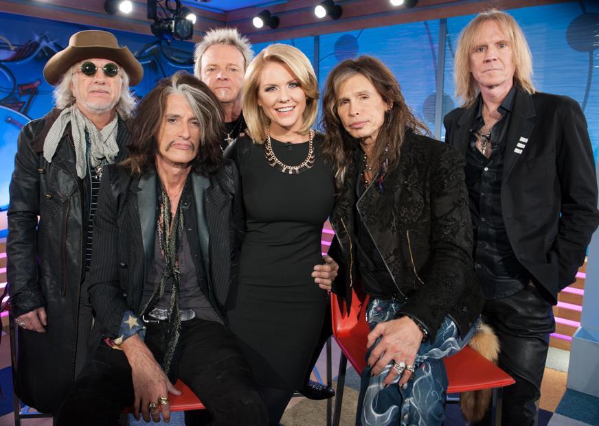 Carrie Keagan with Aerosmith on the set of VH1's Big Morning Buzz Live with Carrie Keagan
