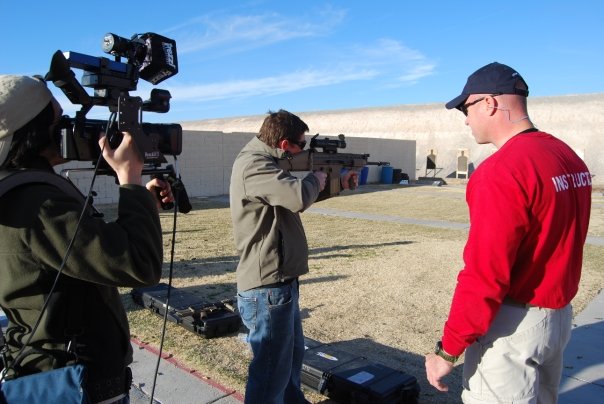 Executive Producer of Outdoor Channel Lloyd Bryan Adams takes aim in Shot Show Special.