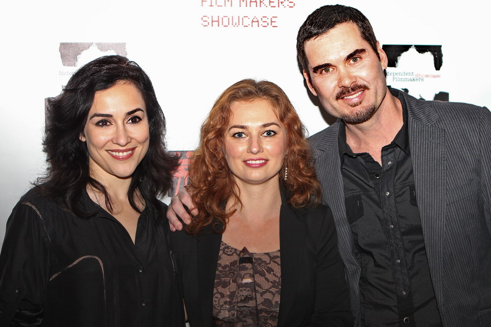SANTA MONICA, CA - MARCH 21: Actress Georgiana Jianu, Actress Elena Evangelo and Actor Matthew Grant Godbey receive the award for Blood Moon- the 14th Annual Independent Filmmakers Showcase Film Festival held at Laemmle Monica Theater on March 21, 2012 in Santa Monica, California. (Photo by Florin Galliano)