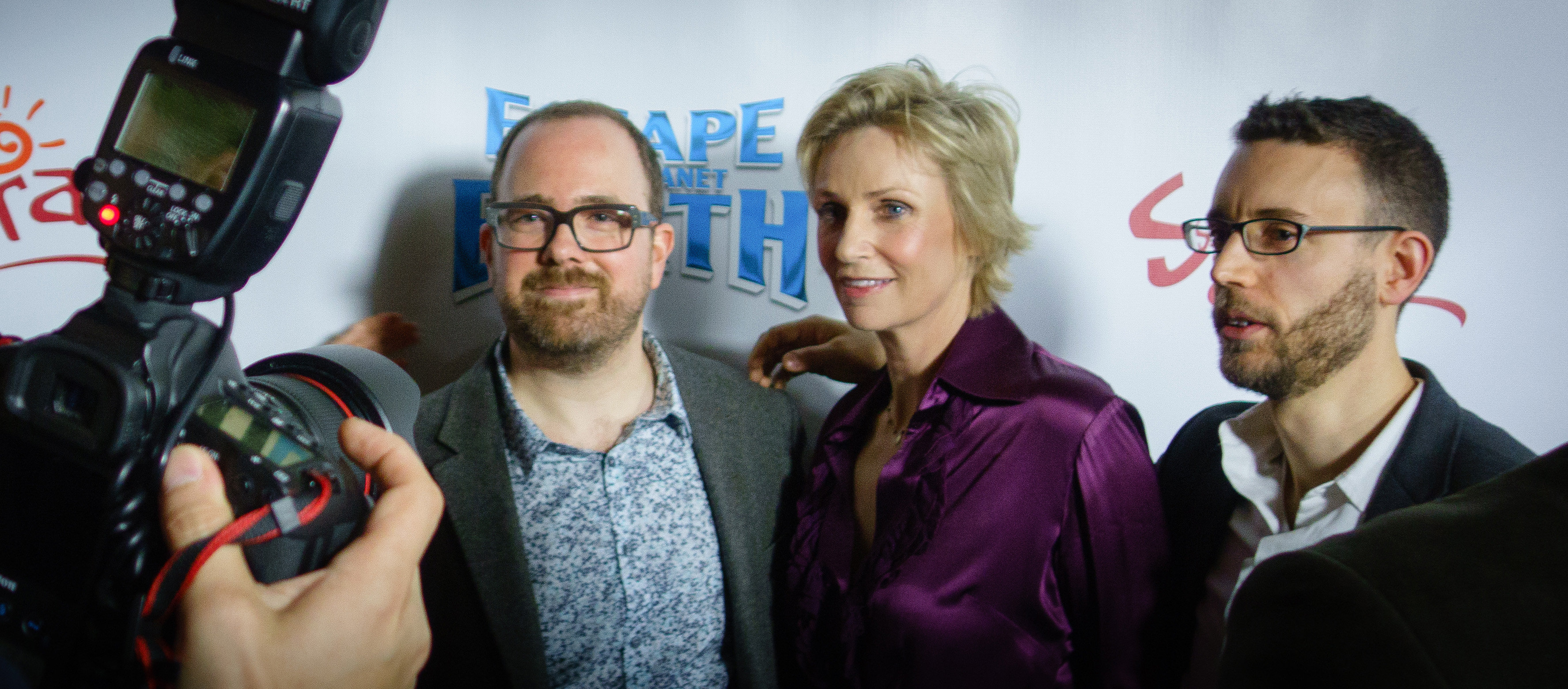 Cal Brunker, Jane Lynch, and Bob Barlen at the Hollywood premiere of Escape From Planet Earth