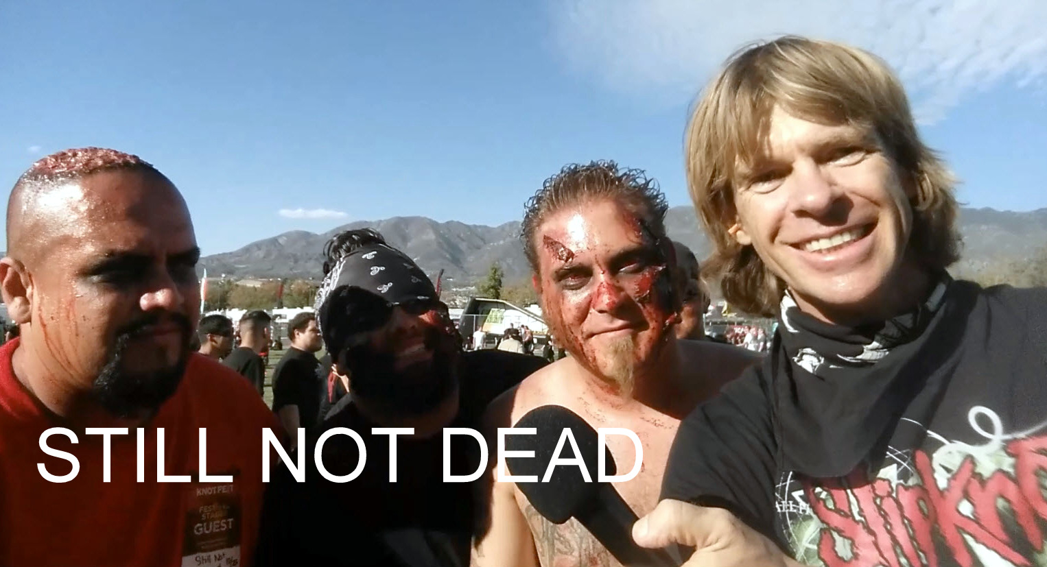 Gregory Graham aka Heavy Metal Greg interviewing the band Still Not Dead at the 2015 Knotfest.