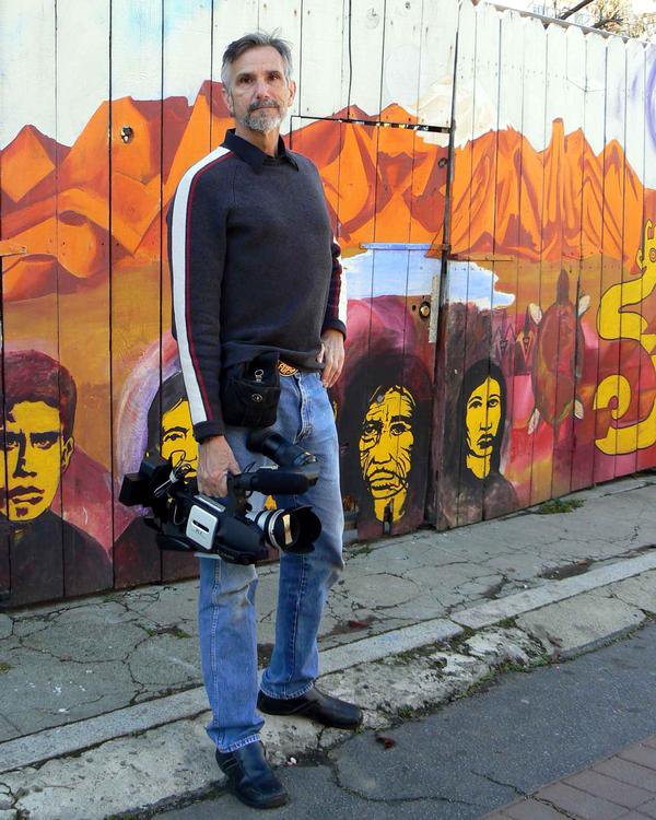 Richard P. Alvarez on the streets of San Francisco shooting behind the scenes footage for film project.