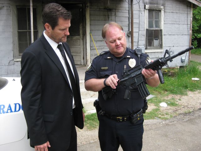 Dean Denton and Weapons Specialists, Lieutenant Kevin Holt on the set of 