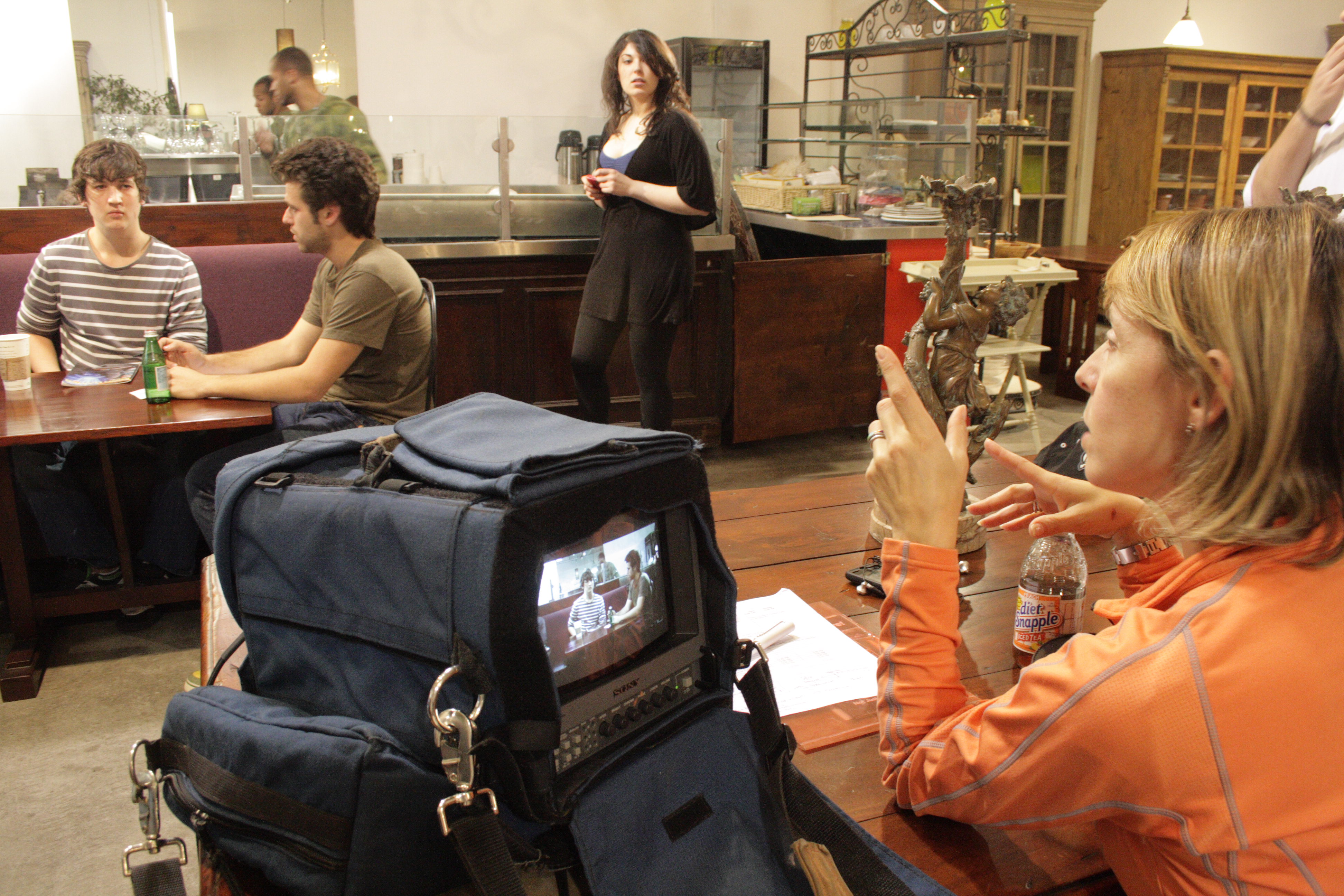 Actors Miles Teller, Jake Levy, Alex Delgrado, and director Alyssa Rallo Bennett on the set of 