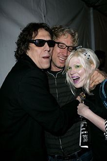 Photographer Mick Rock, Andy Dick and Gidle Partridge.