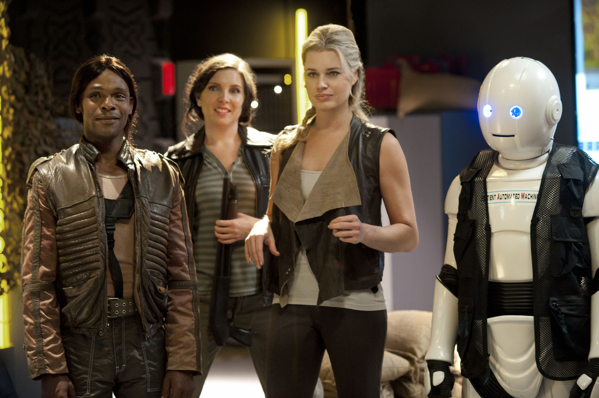 Still of Rebecca Romijn, Brandon Johnson and June Diane Raphael in NTSF:SD:SUV (2011)