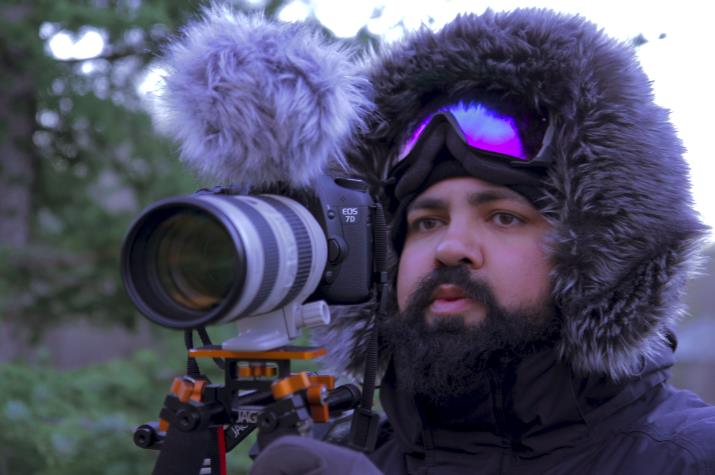 Joshua Ligairi shooting on location in Ruby, Alaska. 2012.