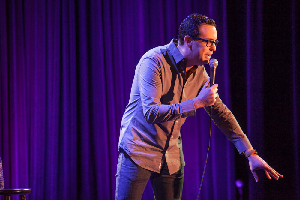Joe DeRosa on stage at SXSW in 2015 for SXSW Comedy with W. Kamau Bell.