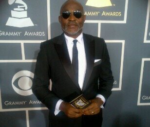 Richard Mofe-Damijo at the 55th Grammy Awards