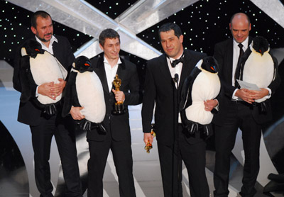 Luc Jacquet, Yves Darondeau and Christophe Lioud at event of The 78th Annual Academy Awards (2006)