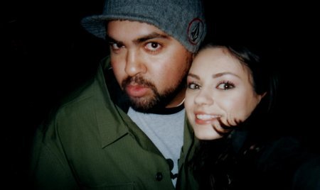 Joshua Ligairi and Mila Kunis on the set of Moving McAllister.