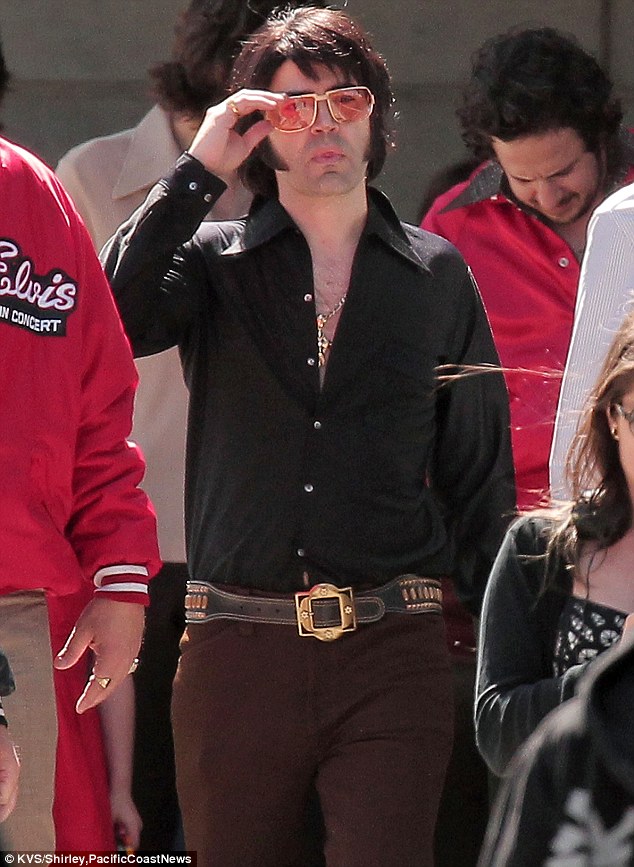 Sara Geralds, Script Supervisor was barely caught in this paparazzi shot of Ron Livingston playing Elvis on the set of 
