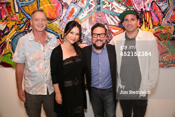 LOS ANGELES - JULY 10: Artist Danny Minnick at his art exhibit poses with John Murray, Patti Schneider, and John Schneider at Gallerie Sparta in Los Angeles, California on July 10, 2014.