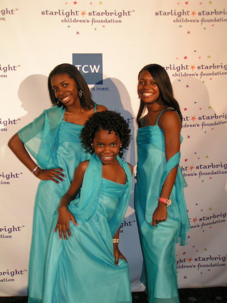 SG3 (Car'ynn Sims, Chris'tol Sims and Ca'Shawn Sims) on the red carpet at The Starlight Starbright Children's Foundation's 