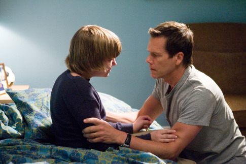Still of Kevin Bacon and Miles Heizer in Rails & Ties (2007)