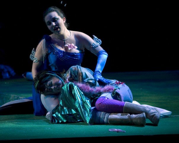 Karenssa, pictured on ground, as Puck in Benjamin Britten's opera, 