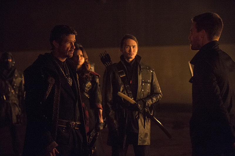 Still of Katrina Law, Karl Yune, Stephen Amell and Matt Nable in Strele (2012)