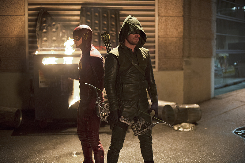 Still of Stephen Amell and Grant Gustin in The Flash (2014)