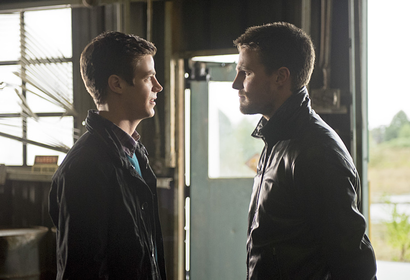 Still of Stephen Amell and Grant Gustin in The Flash (2014)