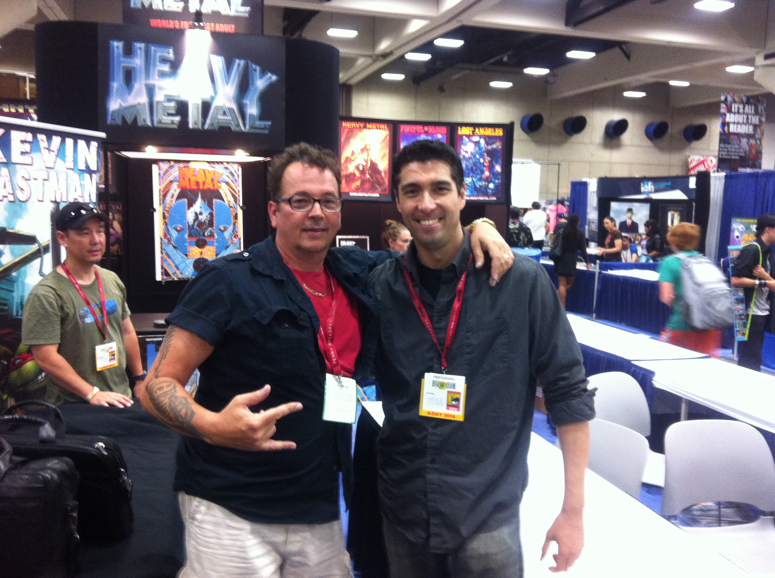 Jin Kelley and Kevin Eastman hanging out at the Heavy Metal booth at Comiccon 2014.