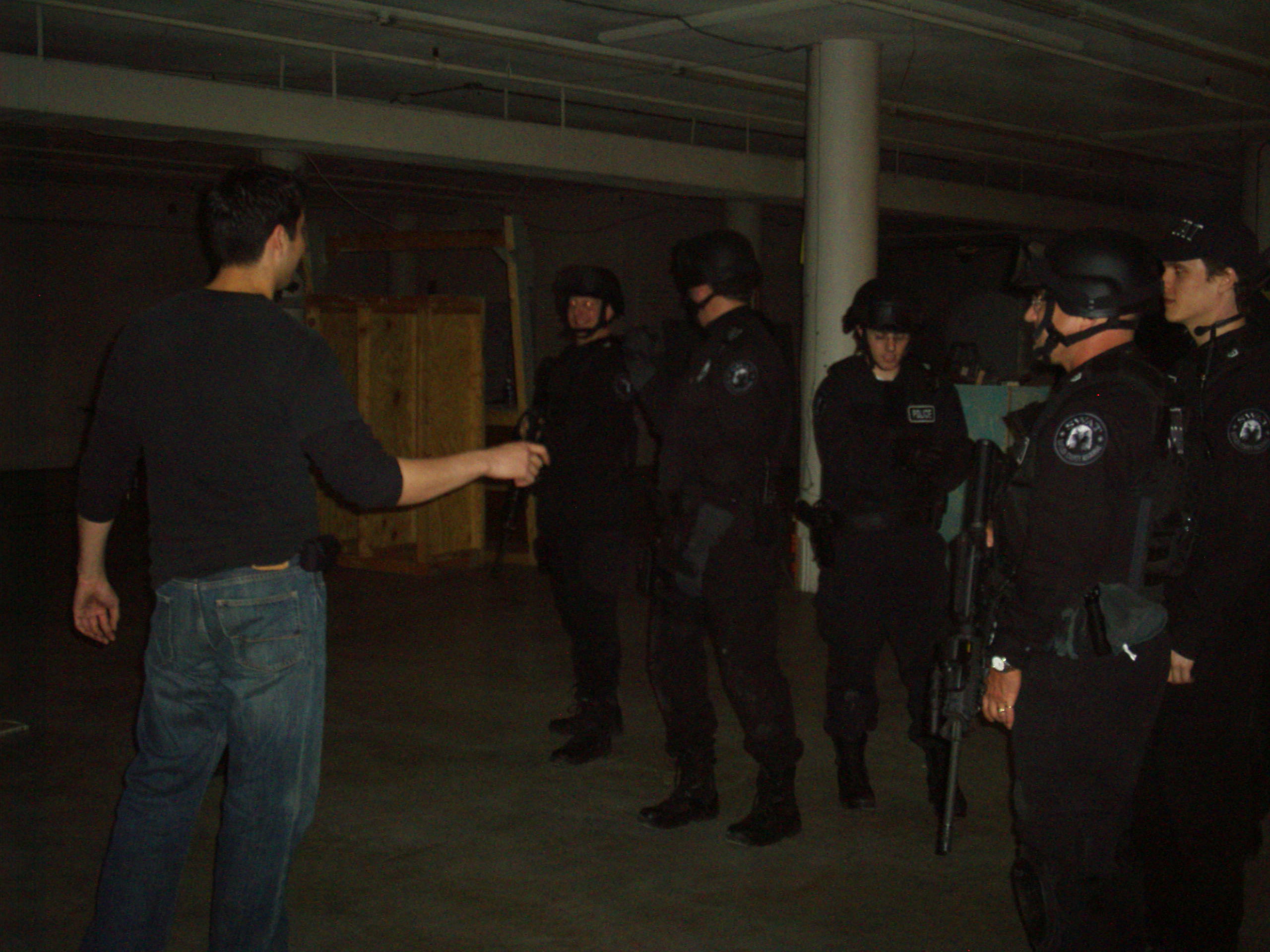 Jin Kelley choreographing SWAT Team Raid on set.