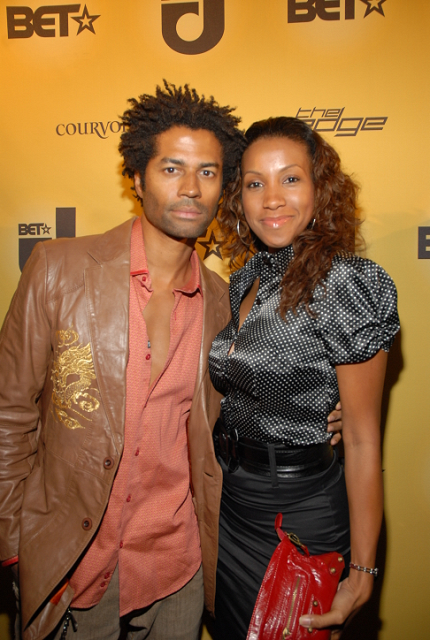 Eric Benet and Temple Poteat on red carpet at BET Fall Launch Party.