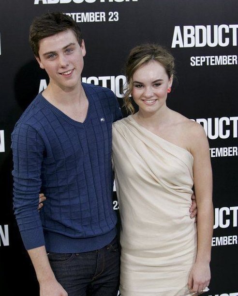 Sterling Beaumon and Madeline Carroll at The World Premiere of ABDUCTION.