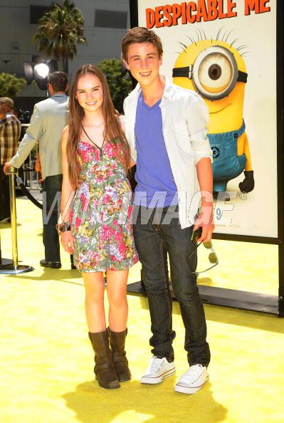 Actors Madeline Carroll and Sterling Beaumon arrive at the 2010 Los Angeles Film Festival - 'Despicable Me' Premiere at Nokia Theatre L.A. Live on June 27, 2010 in Los Angeles, California.
