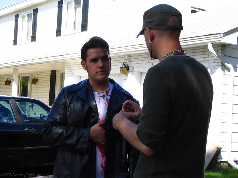 Writer and director Adrian Langley and Matthew Stefiuk (Don Keys) discuss a scene on location.