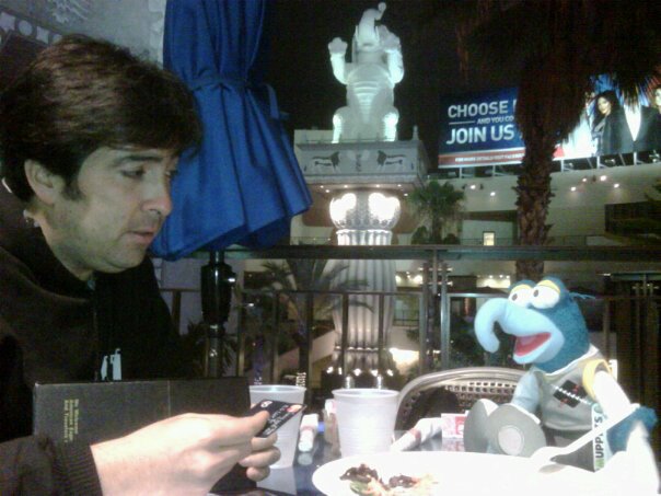 PEDRO ARANEDA (Right) and GONZO from The Muppets (Left) having a business dinner at the Highland Center in Hollywood.