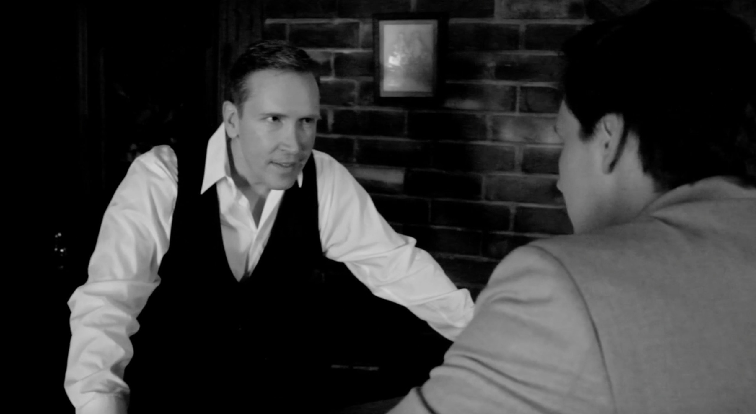 Dwight Turner and Michael Sears Ryan in a scene from Through the Genre (2013)