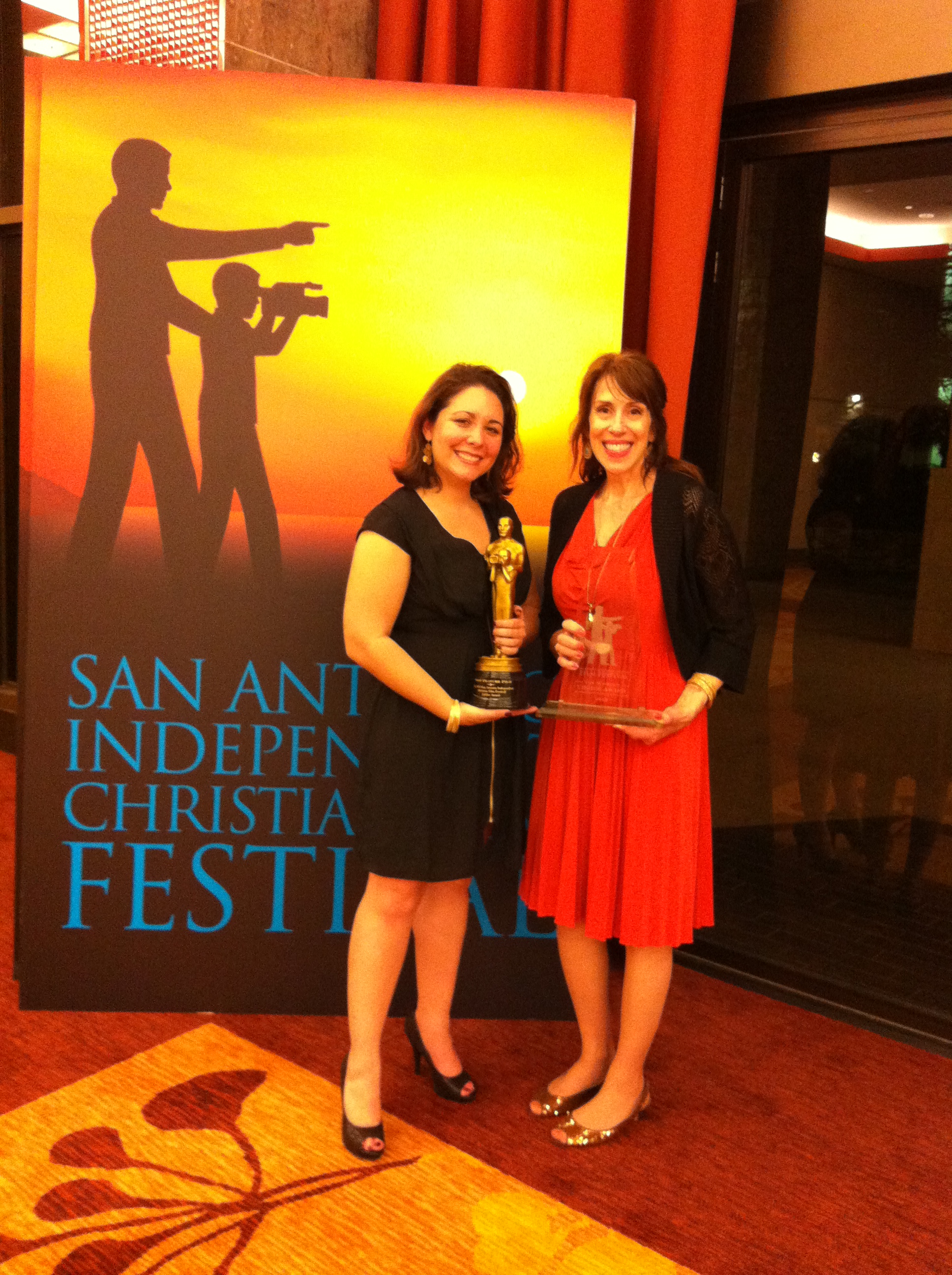 With Petra Spencer Pearce. Holding the awards for Best Feature Film and Audience Choice. San Antonio Independent Christian FF 2013