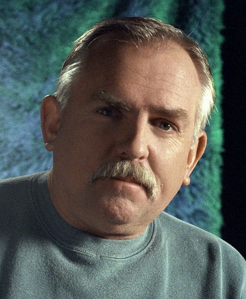 John Ratzenberger in Monstru biuras (2001)