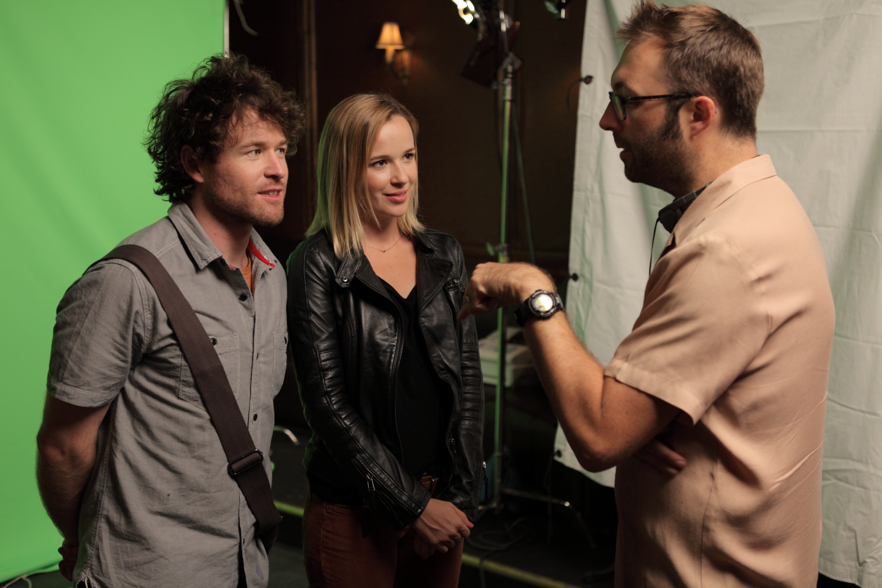Luke Eve on the set of Low Life talking to lead actors Henry Nixon and Claire van der Boom.