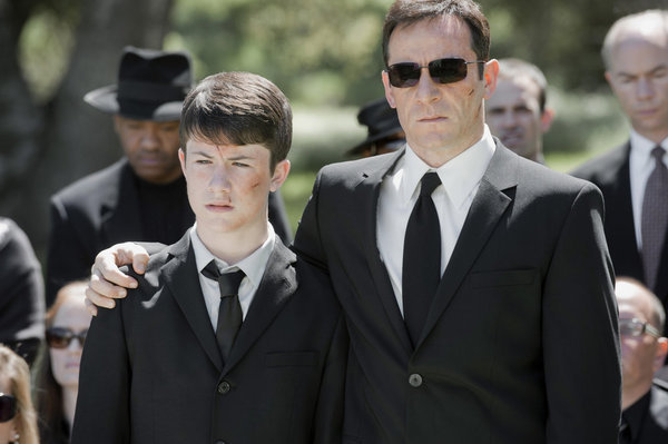 Still of Jason Isaacs and Dylan Minnette in Awake (2012)