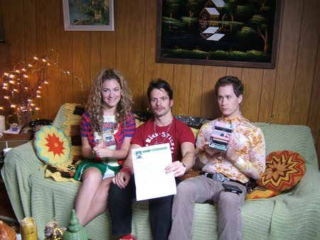 The Trio receive their acceptance to the 2006 Rock, Paper, Scissors World Championships.