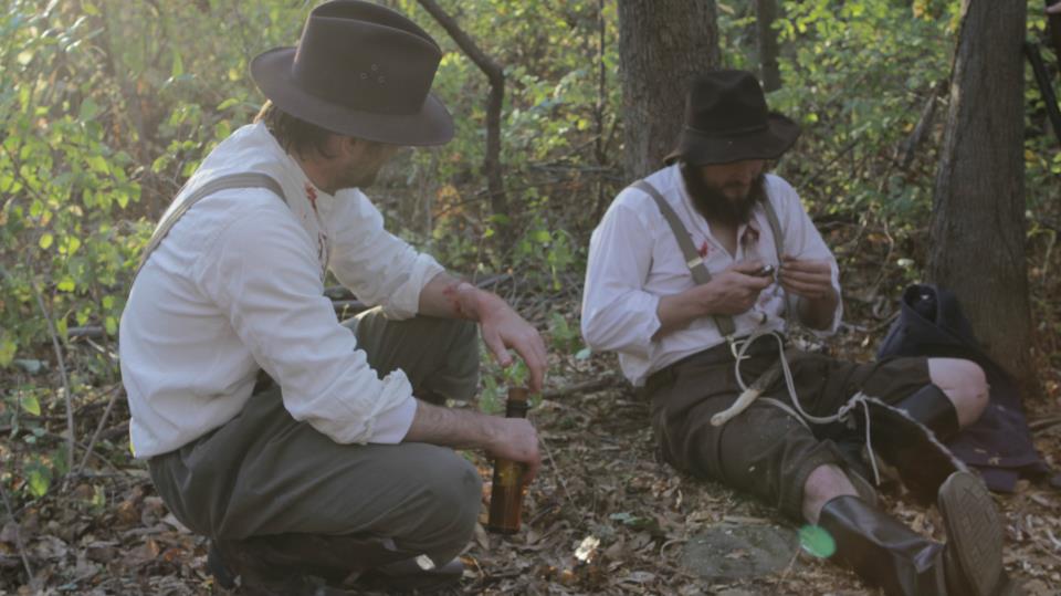Simon (on the left) as Sam in SOLITARY HONOR.