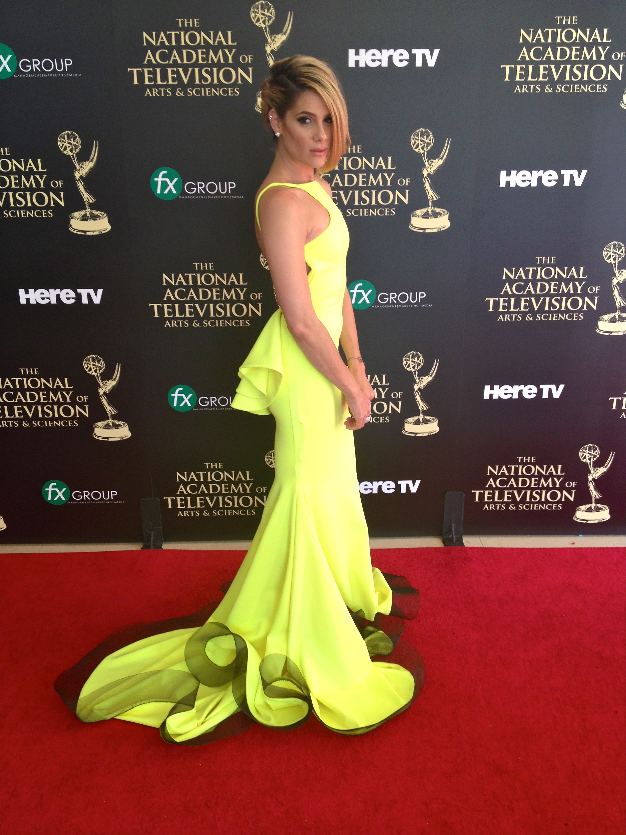 Tiffany Michelle wearing Michael Costello attends the 41st Annual Daytime Emmy Awards with the nominated cast of DeVanity.
