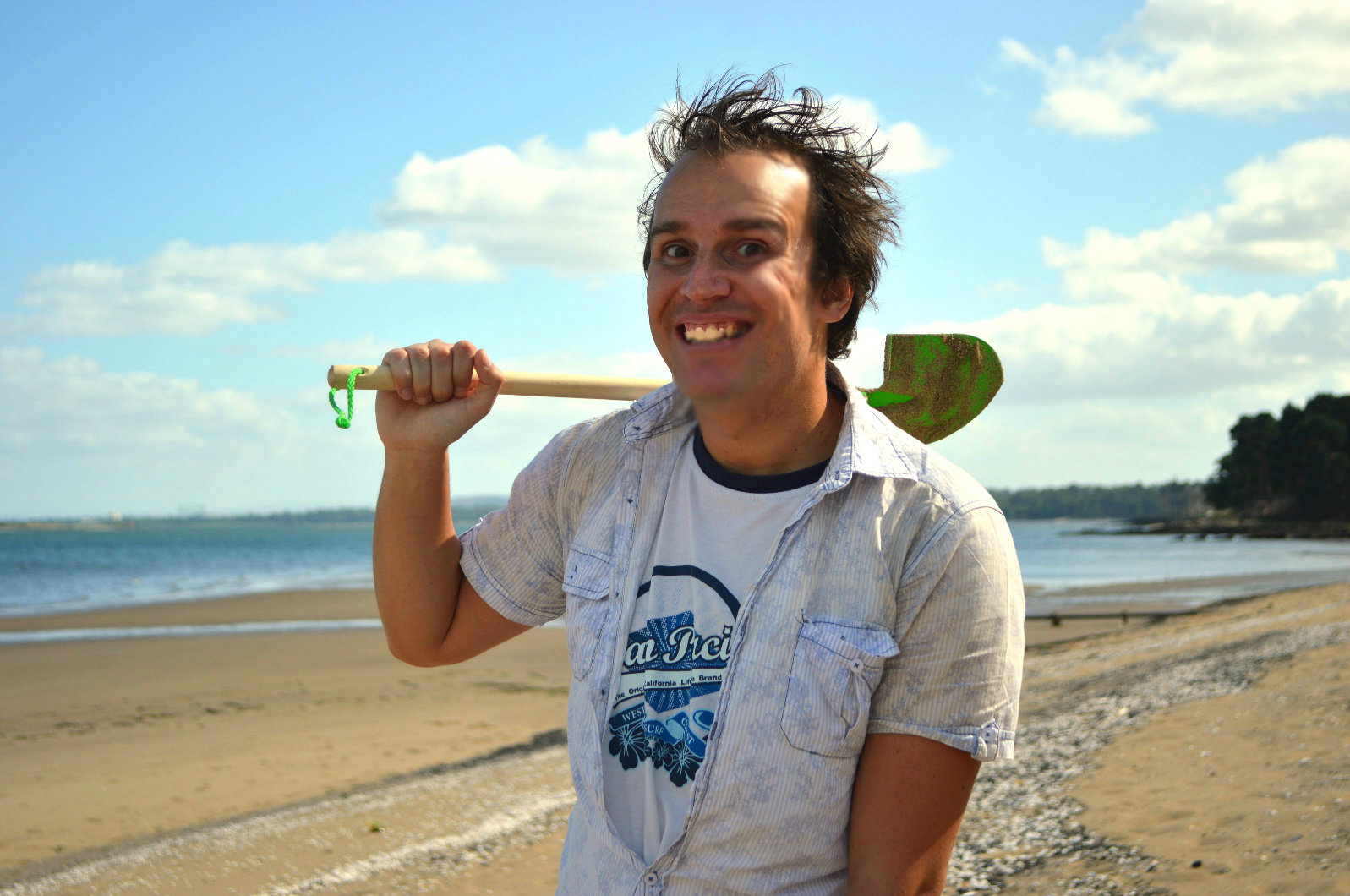 Shawn Watson poses for a photograph while on location at Hound Point Beach.